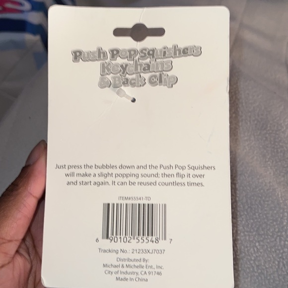 Push pop squishers, key chains, and back clip - Picture 2 of 2